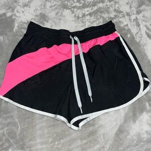 Black and pink athletic shorts